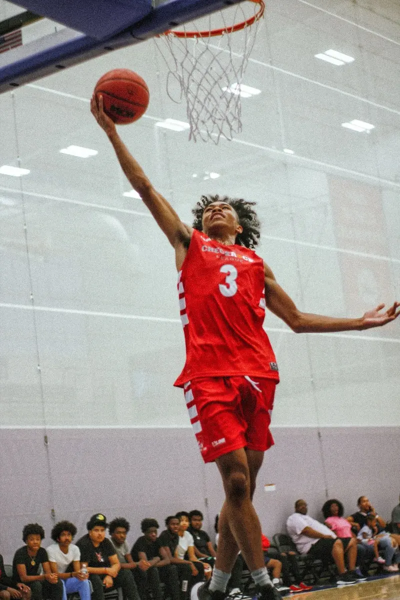 Player rising for a layup